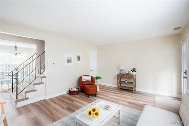 Family room with stairs to the bedrooms, dining ro