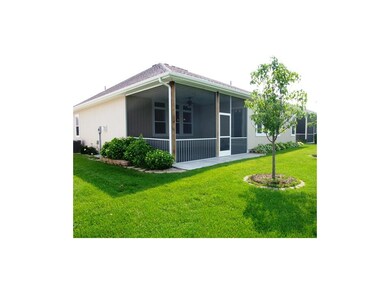 Back Yard and Screened Porch with Beautiful Landsc