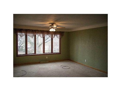 Front Exterior. Bay window in Family Room