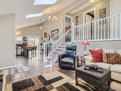 Open floor plan with vaulted ceilings & Skylight
