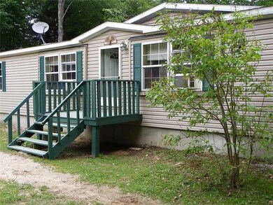 Well maintained home sits on 2 acres...
