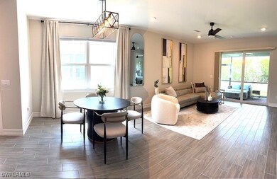 Dining room featuring ceiling fan and tile floors