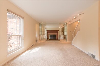 Living room measuring 24 x 12.  Features floor-to-