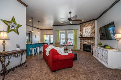 Floor to ceiling brick fireplace is the focal poin