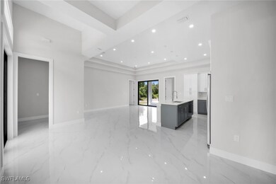 Unfurnished room with marble finish floor, a sink,
