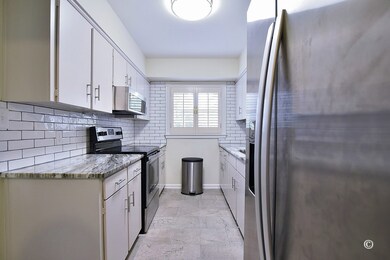 Kitchen with Quartz Counters, Stainless Appliances