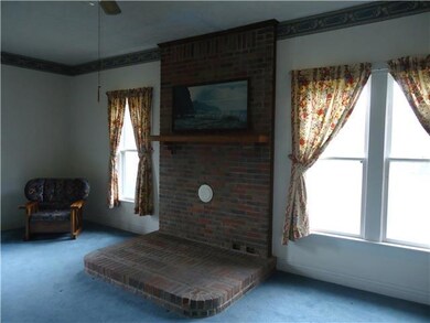 Living room with flue for wood burning heater