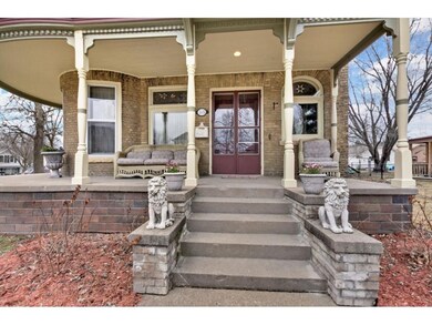 A large, open wrap-around porch welcomes you and y