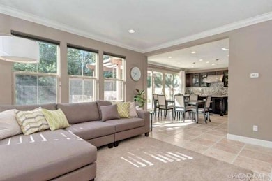 Wide open floor plan with living area and kitchen