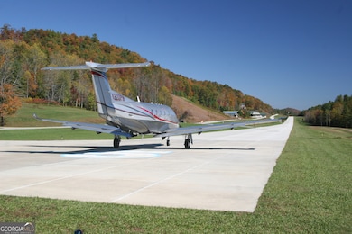 Imagine flying your private aircraft to an amazing new home in the mountains of northeast Georgia!