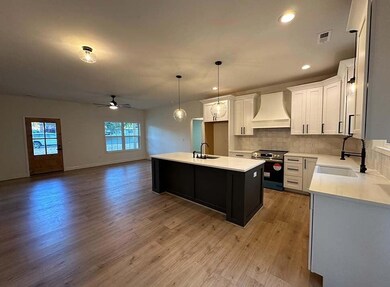 The photos shown are of a previously completed home with the same floor plan. These images are for layout reference only. Finishes, materials, colors, and features may vary and are not representative of the home currently under construction. This is 