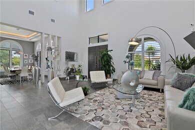 The formal living room opens up to the formal dini