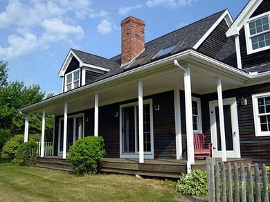 Exterior Back. This dreamy covered...