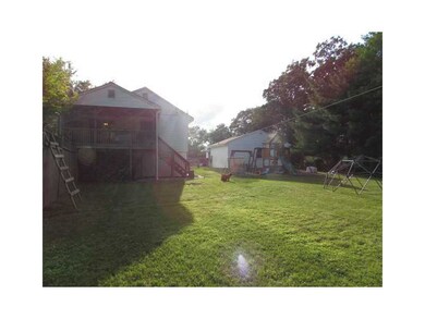 Exterior Back. Fenced in large backyard