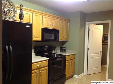 Spacious Kitchen with Black Appliances