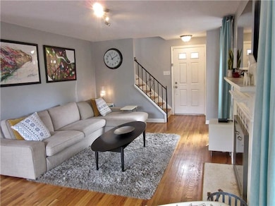 Pretty living room has great natural light from th