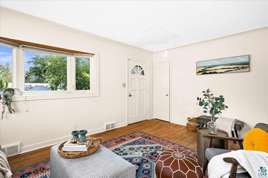 Interior space with hardwood / wood-style floors
