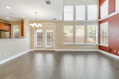 Unfurnished room with dark hardwood / wood-style f