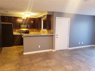 Upgraded Dark Walnut type Cabinets with Granite Co
