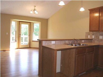 Note the glass door to the deck off the dining roo
