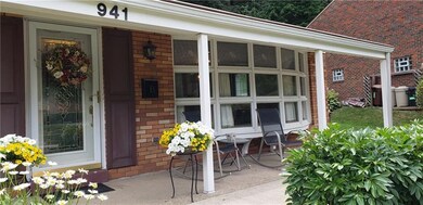 Enjoy coffee or tea on the covered front porch wit