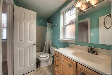 Tub & shower, vanity space.