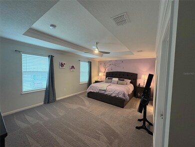 Primary Bedroom-tray ceiling-crown molding-ensuite bathroom