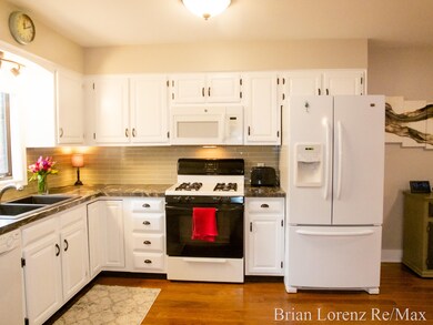 7016 Gardenview Ct SW unit 8, Byron Center, MI 49315 - photo 2