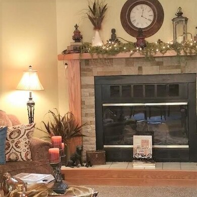 Stacked stone fireplace is a visual focal point