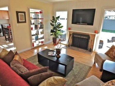 Charming Living room overlooking the backyard.