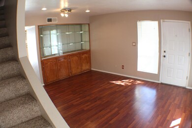 Stairway and Living Room View