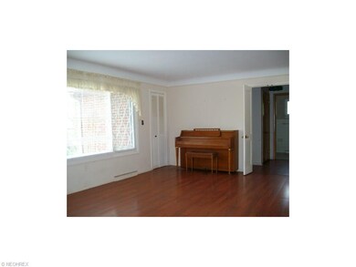 Open Living Room with Picture Window, Laminate Flo