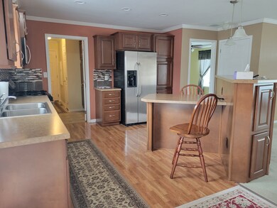 Fully applianced kitchen which leads to separate l