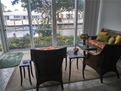 Enclosed patio with impact sliders