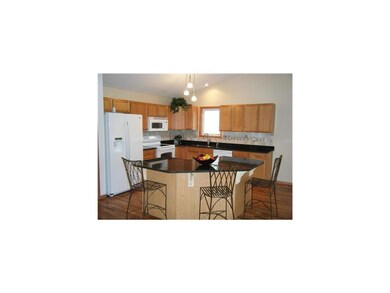 Kitchen. OPEN KITCHEN WITH GRANITE COUNTER TOPS, B