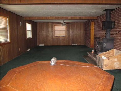Family Room. Working wood burner tied into other m