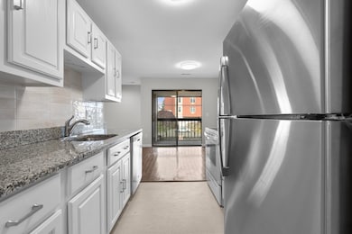 New backspash and tile flooring in kitchen and entryway