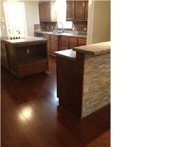 Raised bar with extra cabinets and storage. Ideal 