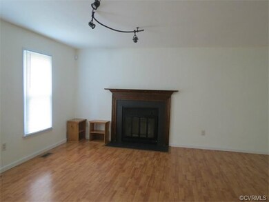 Wood Burning fireplace in Great Room -- note track