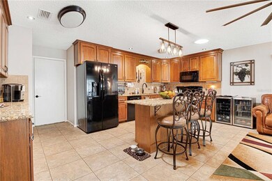 Gorgeous kitchen. Notice all of the cabinets and new lighting