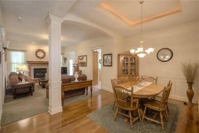 This home has an open floor plan.  The Formal Dining area has beautiful hardwood floors and full access to the Great Room.