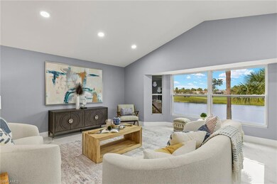 Living room featuring recessed lighting, a water v
