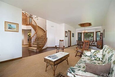 LIVING ROOM LOOKING INTO DINING ROOM