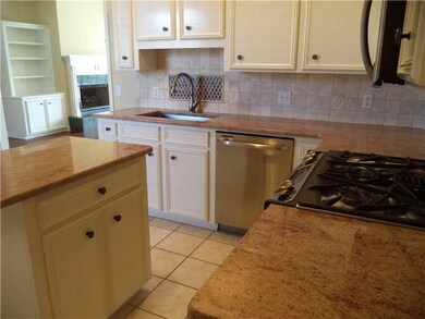 Kitchen View 2. Updated kitchen with gas range/ove