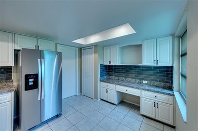Built in desk/entertainment area in kitchen.