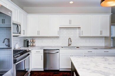 If you want a bright, white, modern kitchen, look 