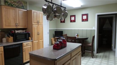 KITCHEN WITH DINING AREA, ROLL OUT CABINET SHELVES