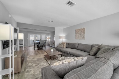 The family room opens up to kitchen and dinning.