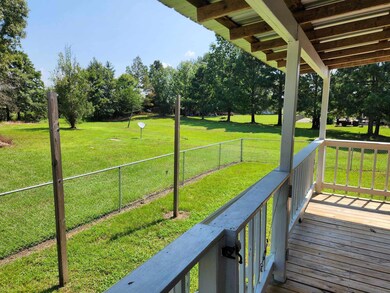 Wooden deck with a yard