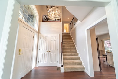 A striking contemporary fixture draws your eye upw